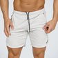 Pantalones cortos casuales de verano de algodón para hombre, para gimnasio, fitness, culturismo, entrenamiento, bermudas hasta la pantorrilla, pantalones cortos para correr, ropa deportiva