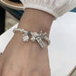Pulsera de cuentas de corazón de amor de color plateado para mujer y niña, 2024, con articulaciones de bambú sencillas, joyería étnica con alas de la suerte, regalo
