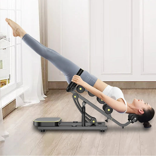 L'équipement de fitness pour le yoga, le soutien du dos et l'étirement de la colonne lombaire est facile à utiliser et à accepter.